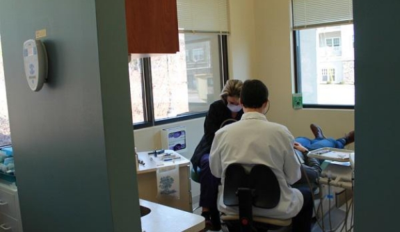 Dentists treating dental patient