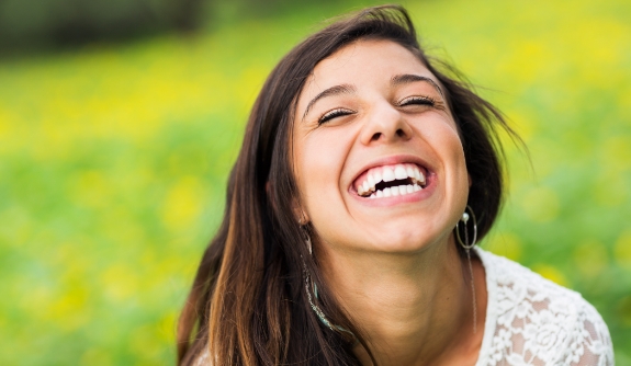 Woman with gorgeous smile after makeover