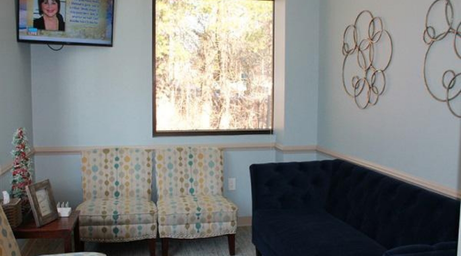 Cozy seating in dental office reception area