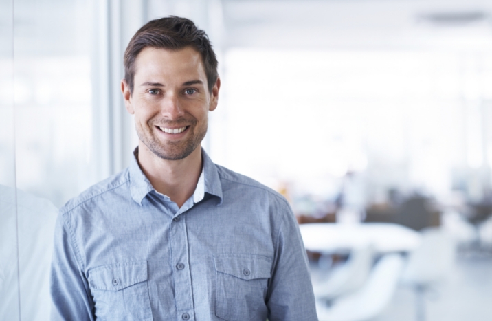 Man with healthy smile after root canal therapy