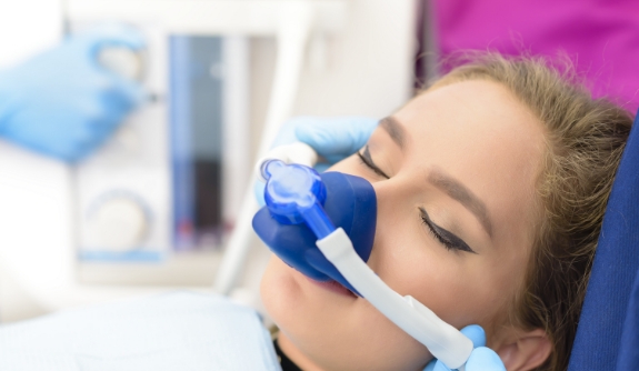 Dental patient relaxing during nitrous oxide dental sedation visit