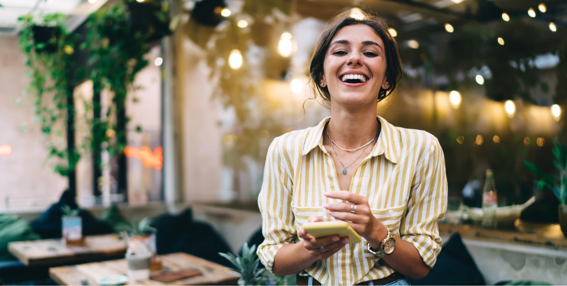 Woman with flawless smile after cosmetic dentistry